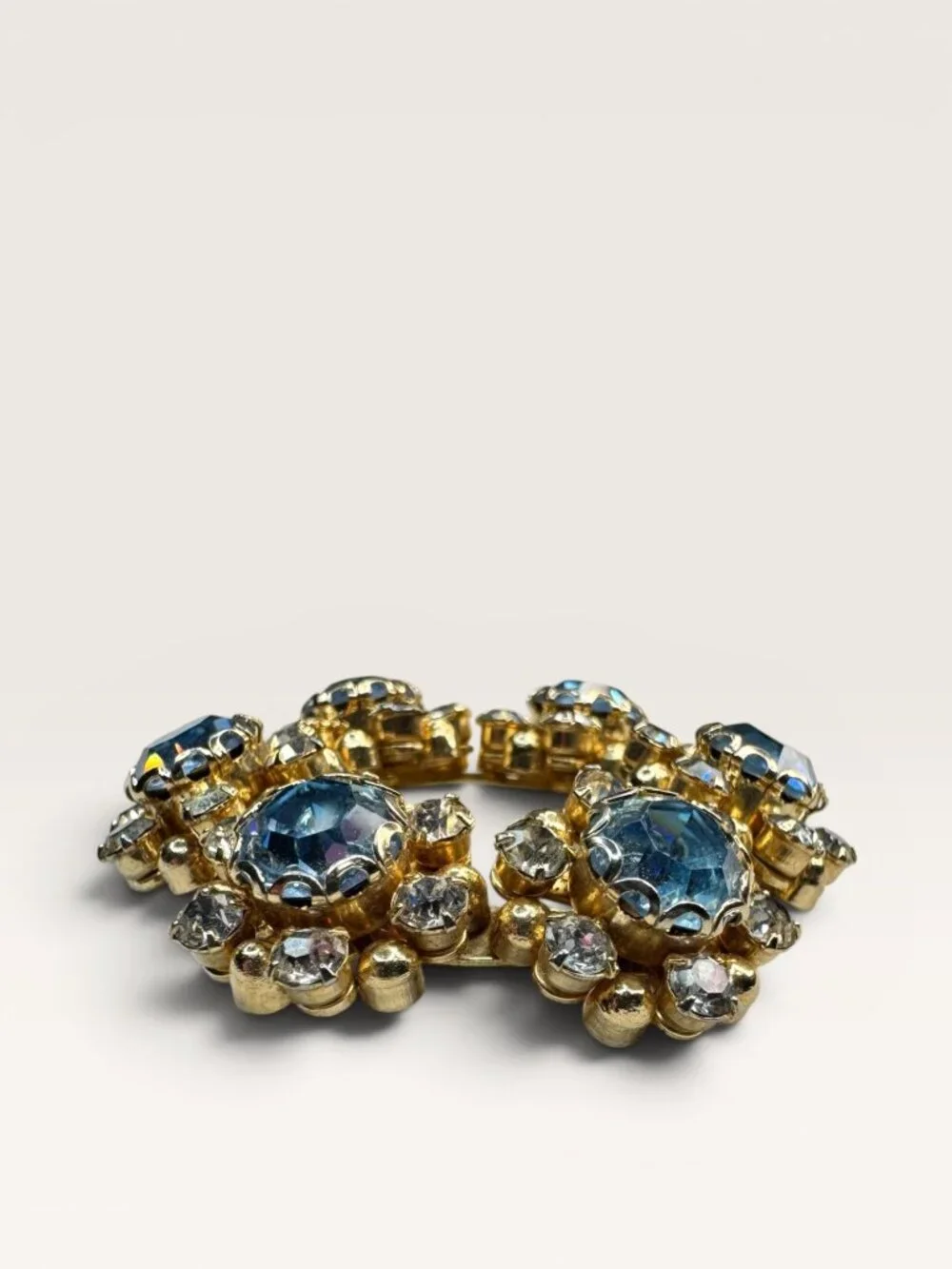 1950s Mid Century Blue Crystal Wreath Brooch Gold Tone Floral Vintage